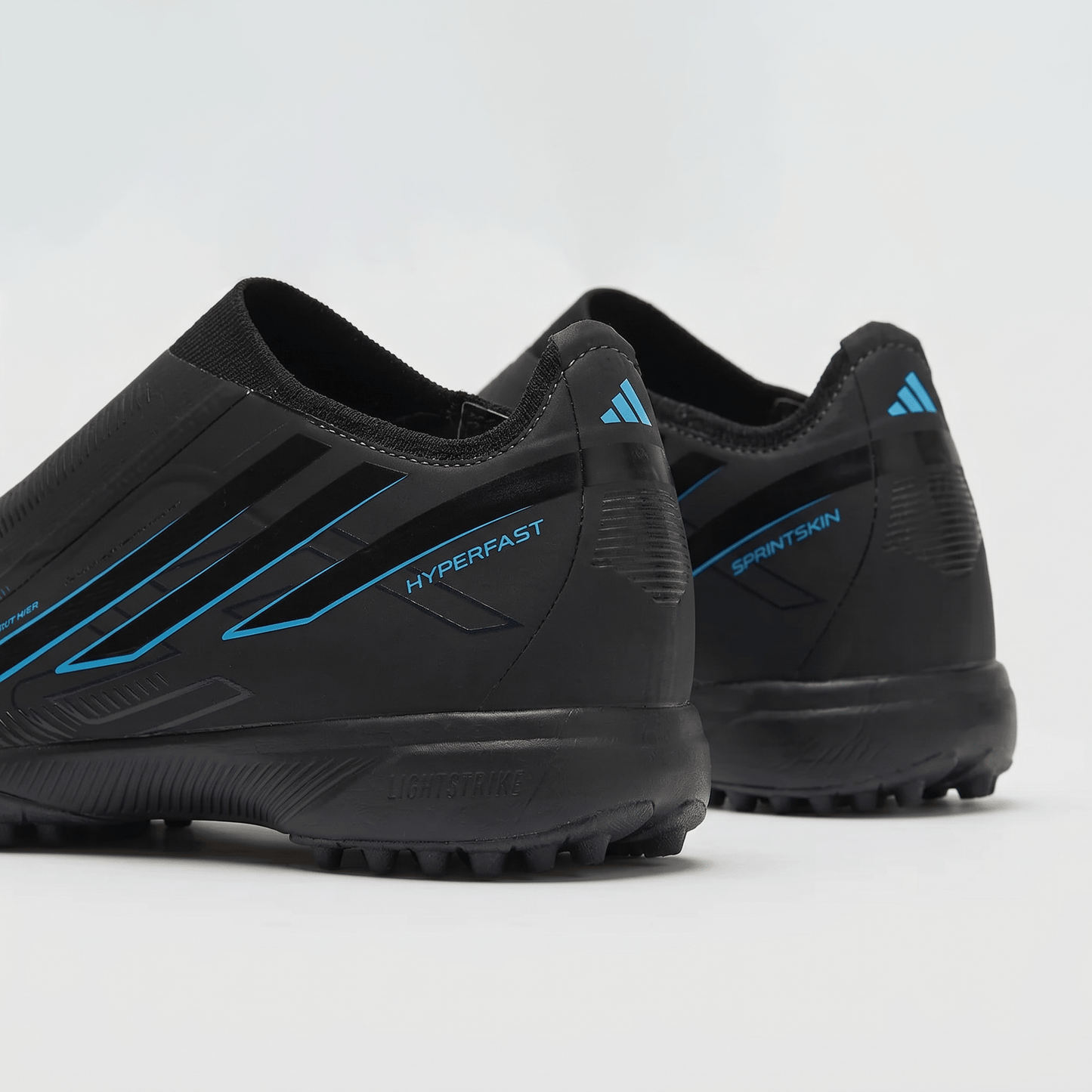 F50 Hyperfast Elite Lightstrike TF Core Black / Electric Blue - Elite Boots