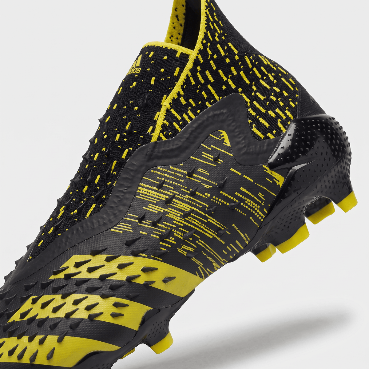 Predator Freak+ FG Core Black / Team Solar Yellow - Elite Boots