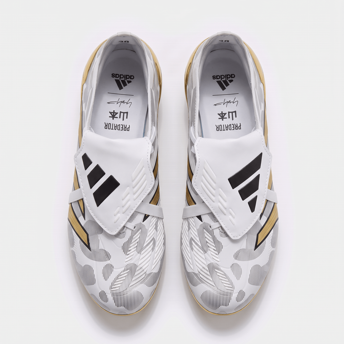 Predator Fold-Over Tongue FG Cloud White / Core Black / Gold Metallic - Elite Boots