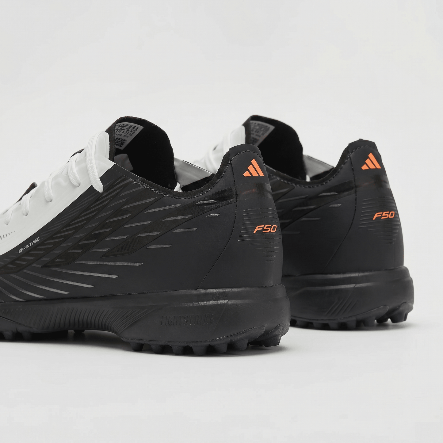 F50 Hyperfast Elite TFColor Core Black / Footwear White / Solar Orange - Elite Boots
