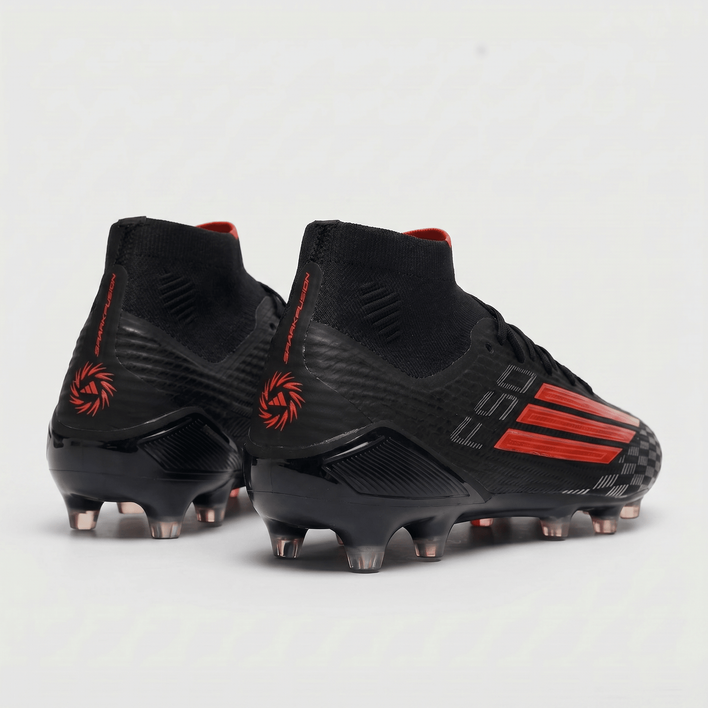 F50 Sparkfusion Elite Mid FGColor: Core Black / Solar Red / Iron Metallic - Elite Boots